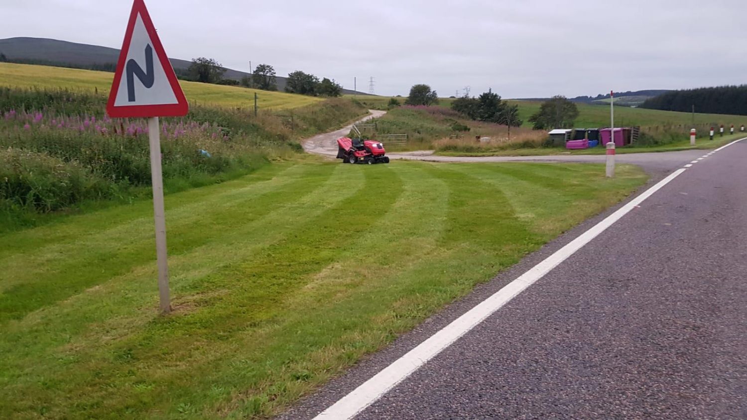 Scott Donald C60 garden tractor cutting grass